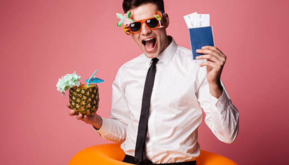 Happy,Man,In,Sunglasses,And,Official,Shirt,Showing,Cocktail,And